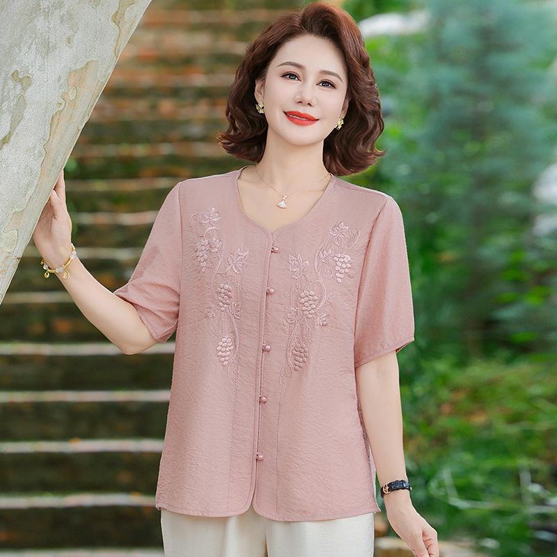 

Young Mother s Summer Artistic Embroidered Short-Sleeve Top - Casual Loose Fit for Middle-Aged and Elderly Women. 4XL (Approx. 67.5-75 kg) розовый