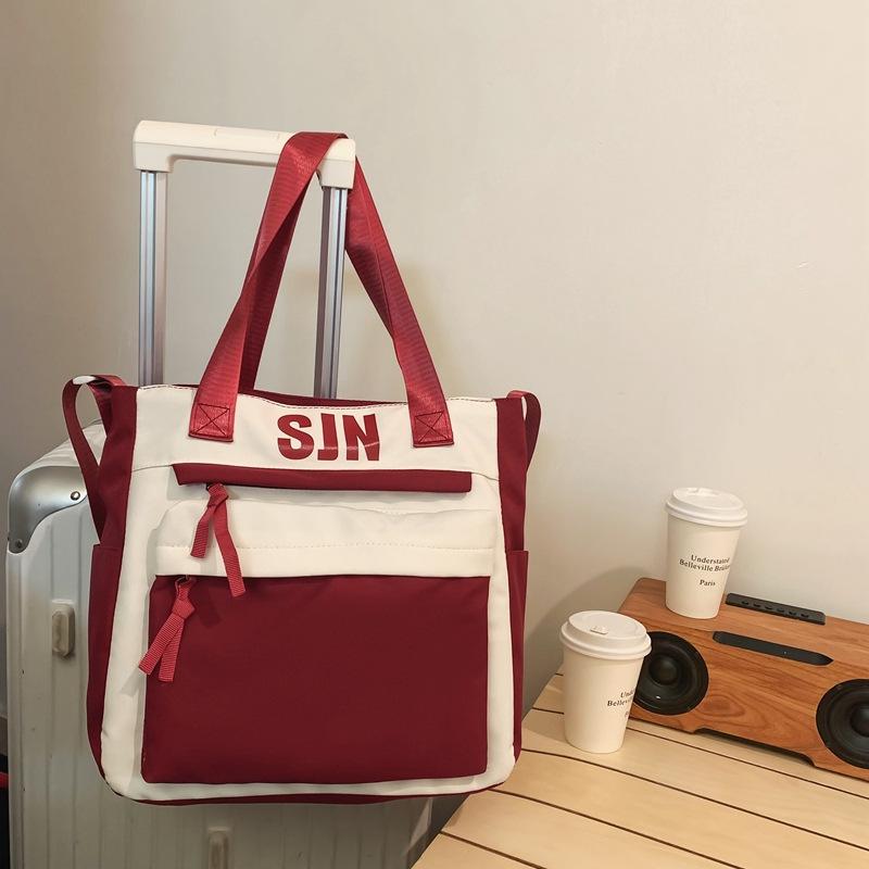 Schoolbag Japanese simple and fashionable backpack 1011 summer new middle school schoolbag college student college style alphabet backpack