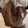 Leopard Print Suede Bucket Bag: Large Capacity Shoulder Bag for Daily Commute, Lazy Style Niche Design 2025