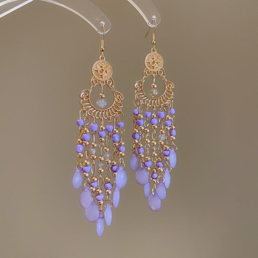 Retro ethnic style round hollow earrings Bohemian temperament elegant earrings niche fashion light luxury earrings women