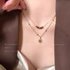 "Elegant Korean Titanium Steel Zircon Bow Necklace for Women"
