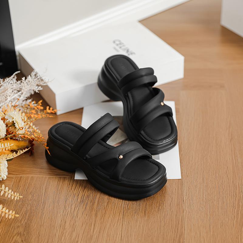 Lightweight, fashionable temperament, versatile one-word thick-soled slippers for women's summer wear 2025 new black height-enhancing cool slippers
