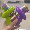 Children's Soft Bullet Carrot Gun - Rapid-Fire Ejection Toy Pistol with Frisbee Flying Saucer for Boys and Girls.