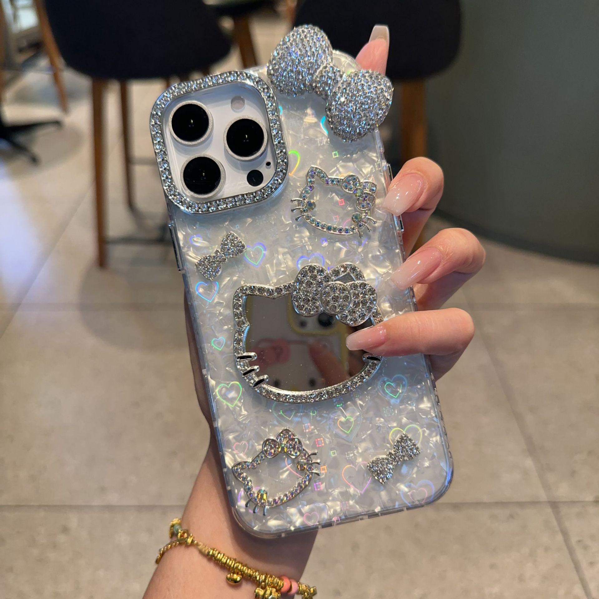 

KT Cat Mirror Phone Case for Apple 16/17 Pro Max with Flashing Diamond Bow and Textured 14/15 Design. 17