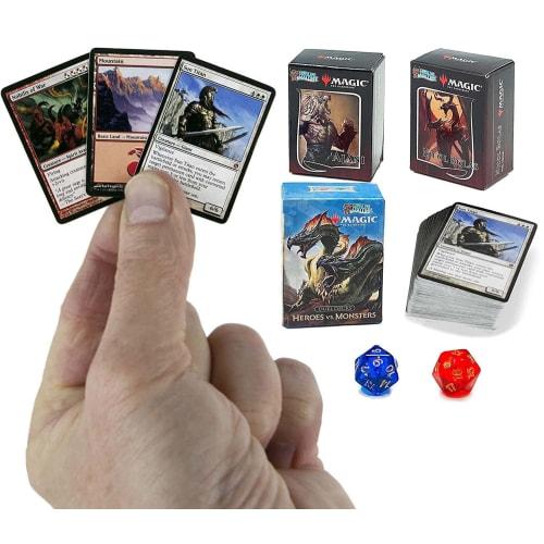 The world's smallest Magic: The Gathering exclusive collector's set, featuring Ajani vs. Nicol Bolas and Heroes vs. Monsters dueling decks and exclusi