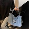 Korean version of simple large-capacity tote bag casual denim cloth bag women's spring 2025 new commuter oblique span bag