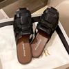 Baotou slippers women's outer wear 2025 summer new retro beach flat-bottomed woven sandals versatile lazy muller shoes