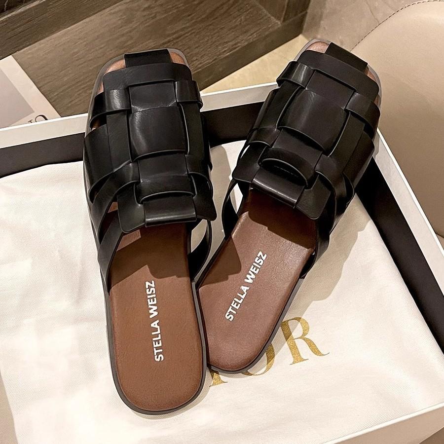 Baotou slippers women's outer wear 2025 summer new retro beach flat-bottomed woven sandals versatile lazy muller shoes