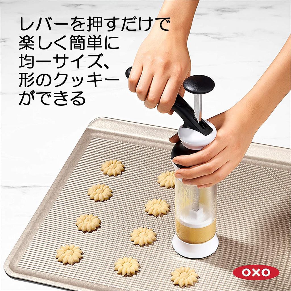 OXO Cookie Press with 12 Simply add dough and press the Discs lever.