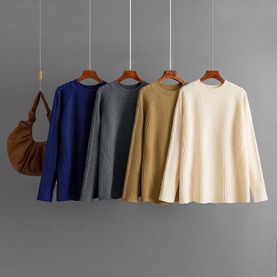 This Is A New Autumn and Winter Knitted Sweater for Women. It Features A Round Neck, Loose, Lace and Casual Solid Color Knitted Base Layer
