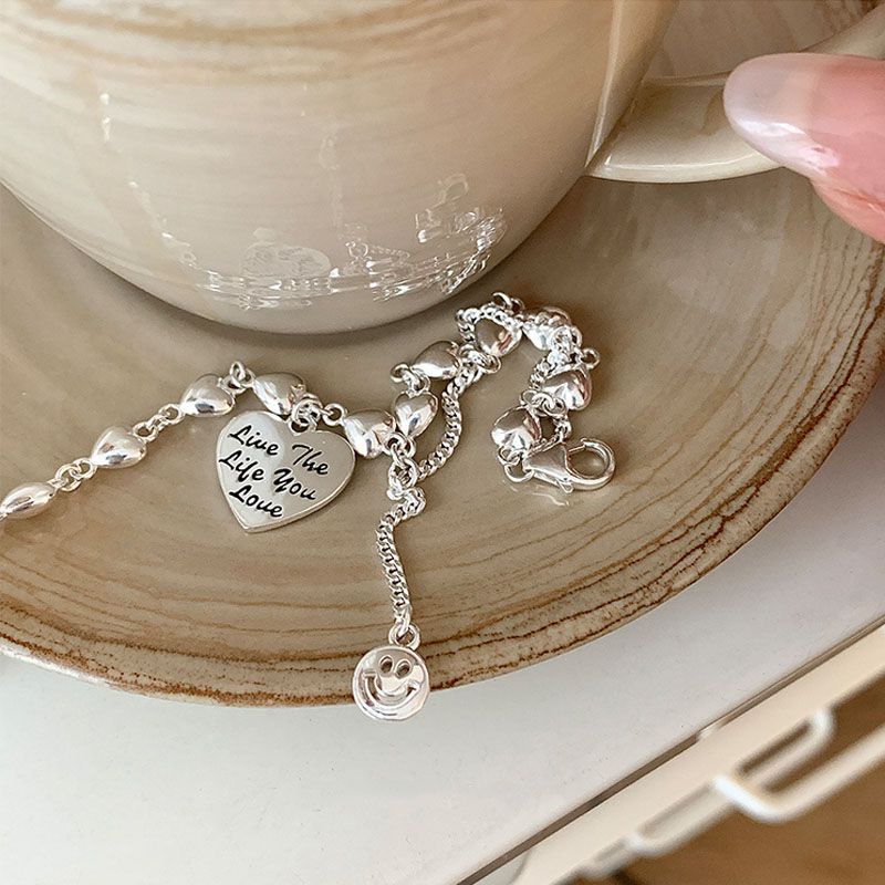 Light luxury niche sterling silver heart bracelet with bell pendant2026New best friend jewelry, a gift for girls