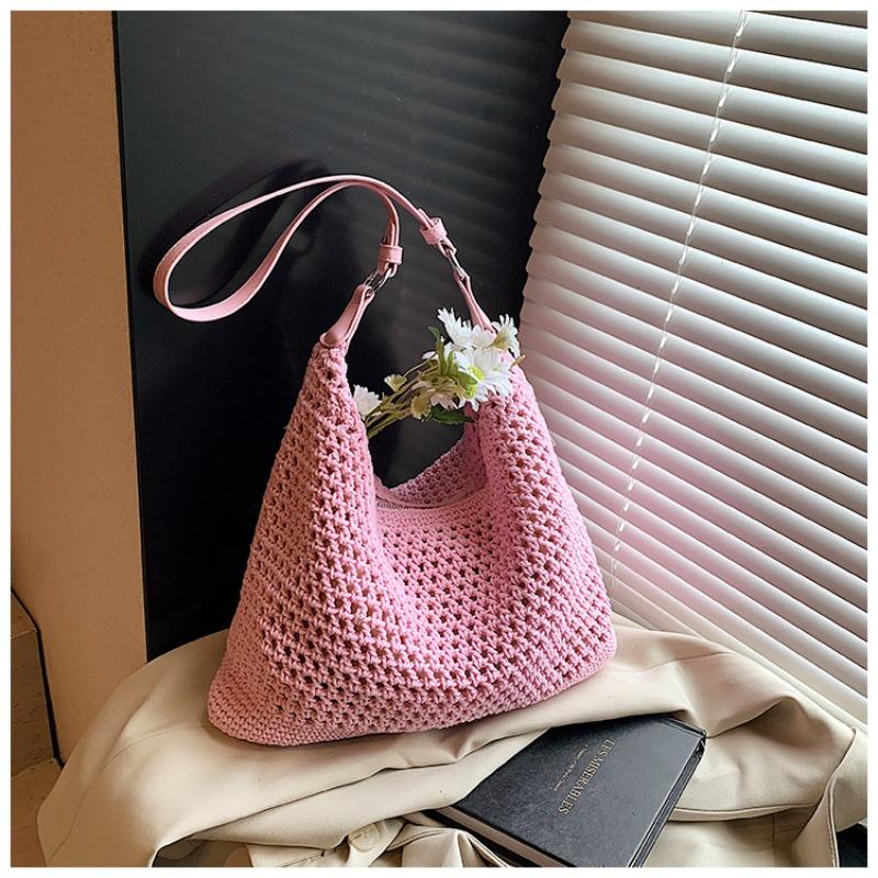 

New popular beach bag female senmeng summer weaving seaside vacation weaving bag shoulder armpit bag рожевий