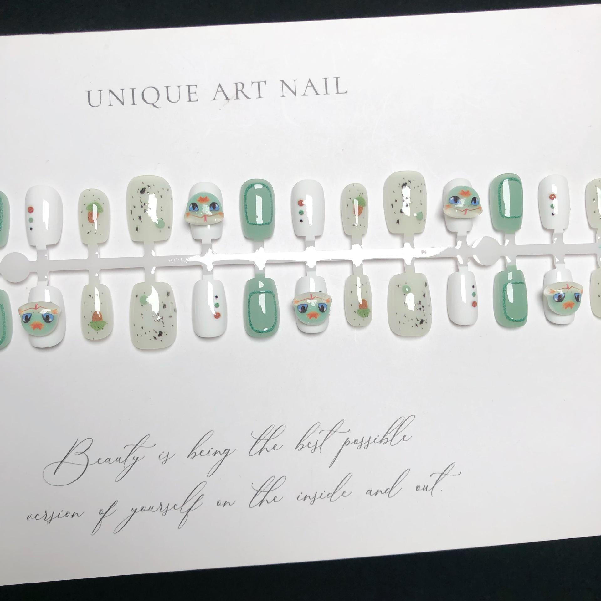 

Wearable Snake-Themed Cartoon Nail Art Patches - Cute, Short, and Removable Fake Nails for New Year.