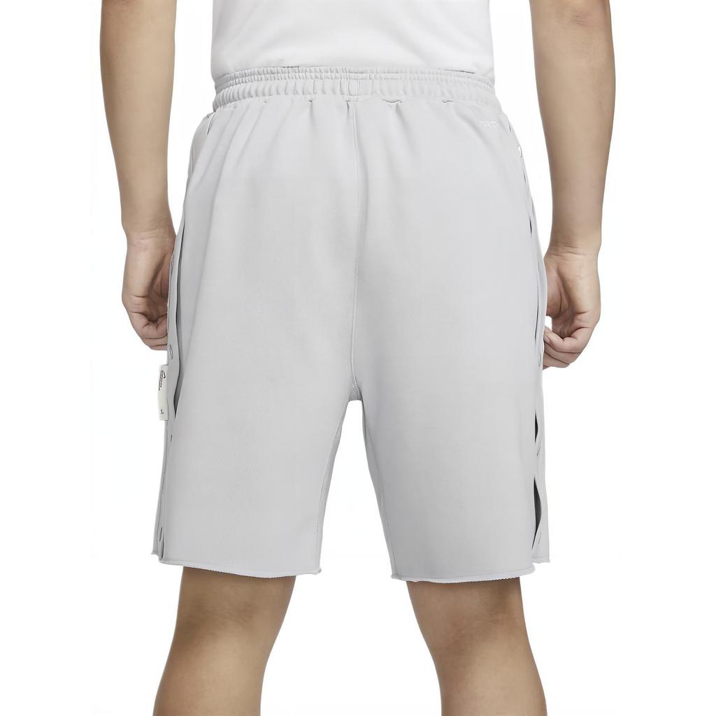 Nike Dri-FIT Sport Standard Issue Jednobarevné šortky na basketbal se šněrováním a středně vysokým pasem Pánské šortky Vlčí šedá Černá FN2891-012