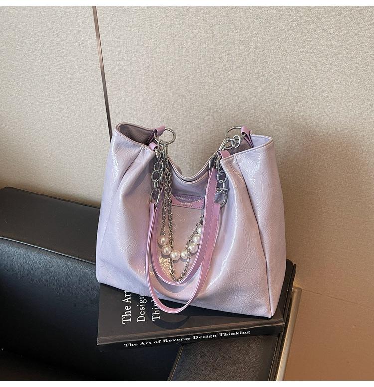 

2025 New Fashion Versatile Shoulder Underarm Bag Premium Niche Design Handbag Women s Commuter Tote Bag фіолетовий
