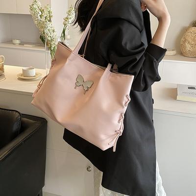 Die diesjährigen beliebten hochwertigen strukturierten Handtaschen, neue vielseitige Freizeittaschen für Frühjahr 2025, Schmetterlings-Tragetaschen für Damen
