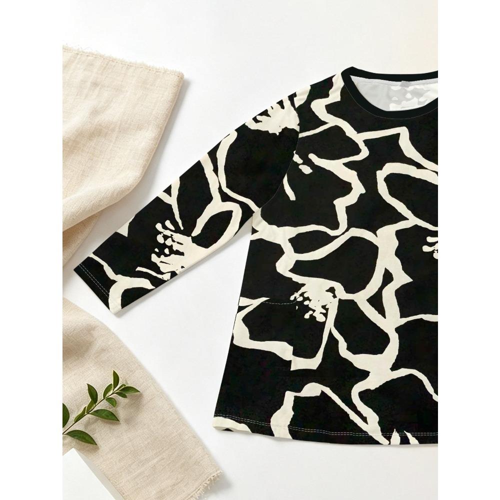 Women's large size with pocket design black and white abstract printed long-sleeved loose top, fashionable versatile casual T-shirt