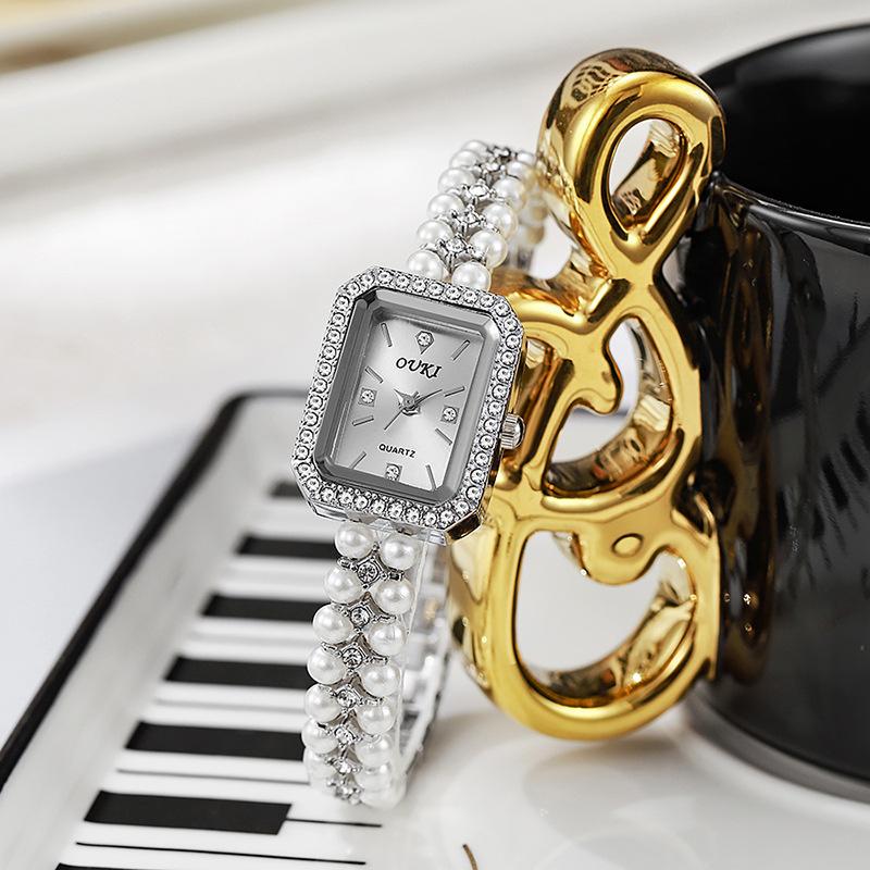 Damen Elegante Uhren Top Luxus Design Damen Quarz Armbanduhren Marke Geschenke Uhr für Ehefrau, Freundin, Familie