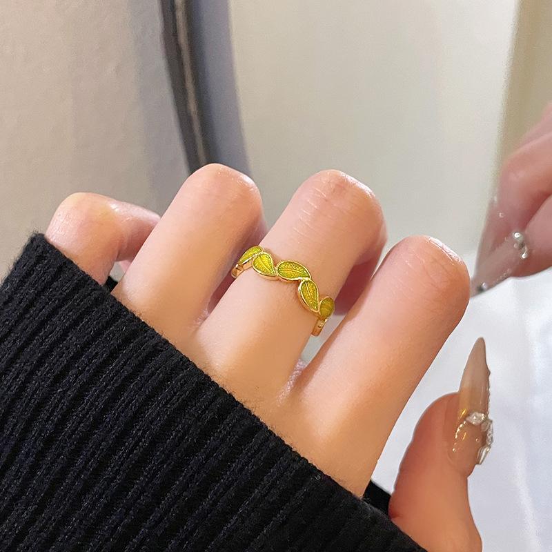 

Golden Branch Jade Leaf Enamel Gold Open Ring Women S Personality Fashion High Sense Stripe Niche Design Ring