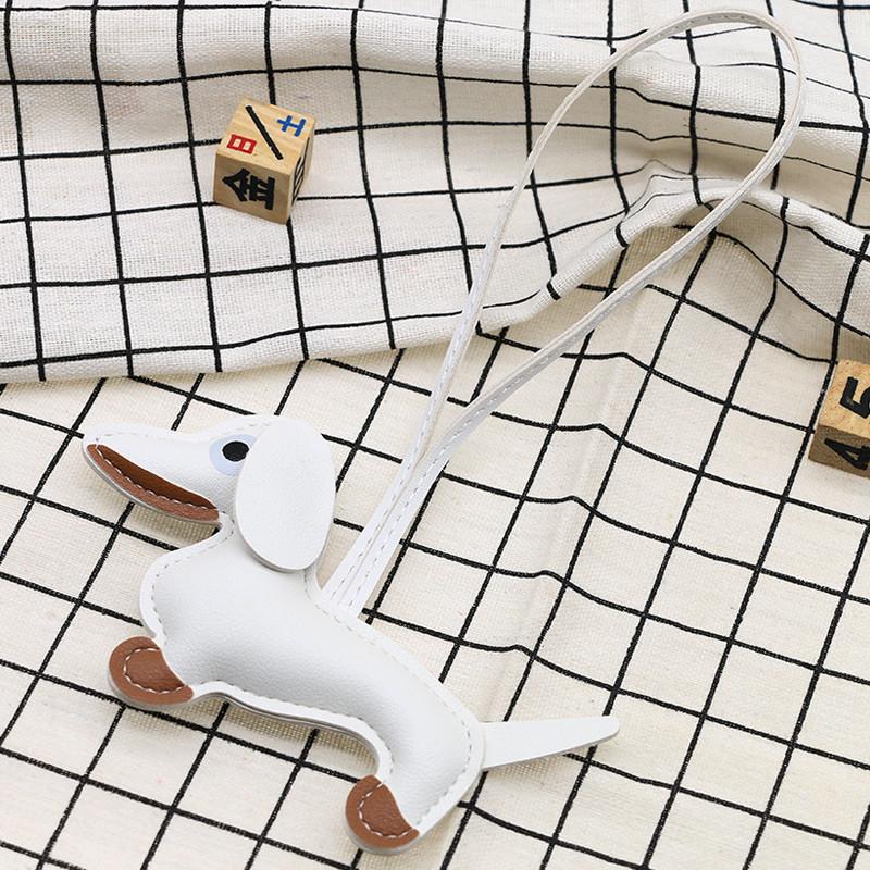 Dackel-Lederanhänger: Süßer Welpen-Schlüsselanhänger und Auto-Ornament für Paare.