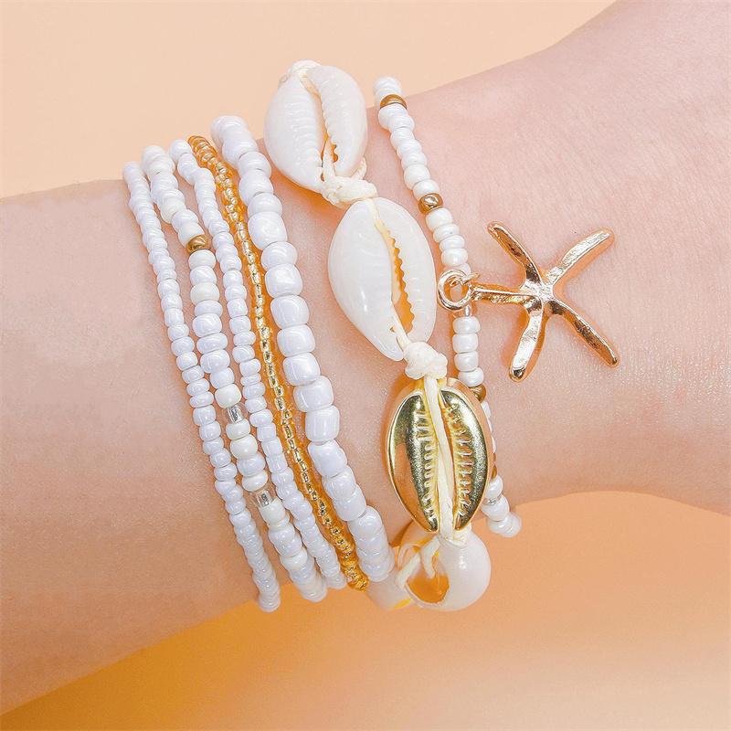 

Bohemian Cowrie Shell Bracelet Set for Women Gold Color Starfish Charm Multilayer Beads Chain Handmade Summer Beach Jewelry Gift
