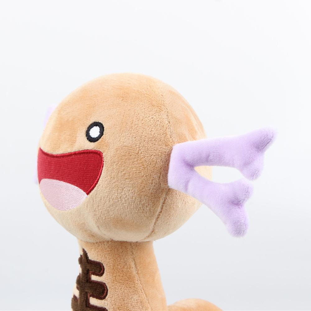 Il Peluche Wooper di Paldea È Un Peluche Carino Realizzato Nei Colori Rosso E Viola