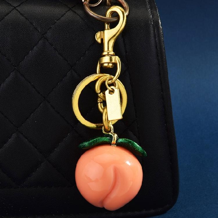 Kompakter Pfirsichförmiger Schlüsselanhänger Dekorativer Anhänger Tasche Hängender Anhänger Schlüsselanhänger für Geldbörse Rucksack Schlüssel Organizer