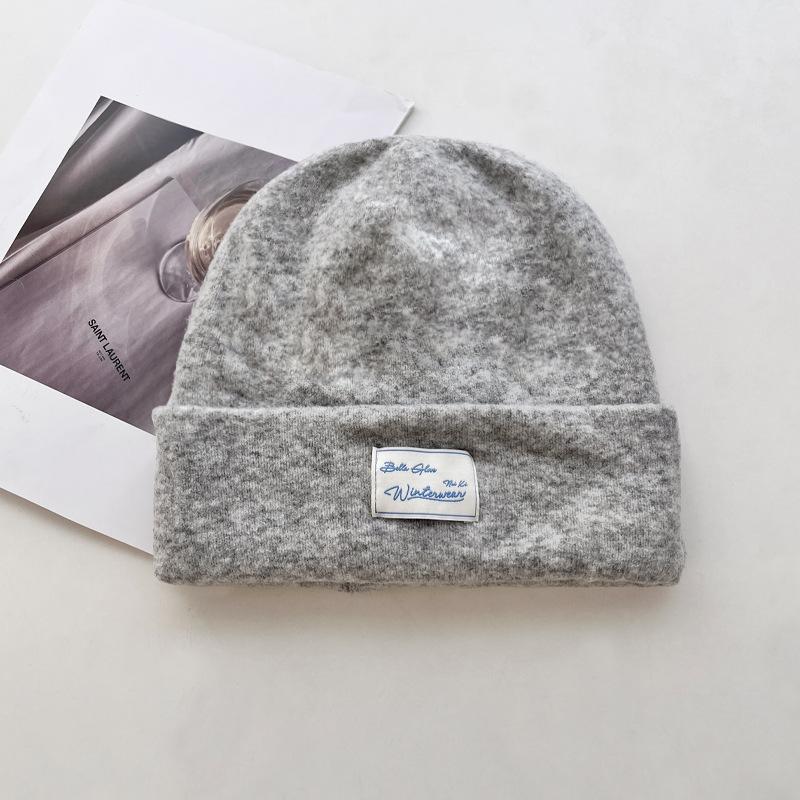 

Корейская новая универсальная вязаная шапка из шерстяной смеси для женщин, осенне-зимняя, двухслойная, утолщенная, теплая, с защитой ушей, шерстяная шапка One Size