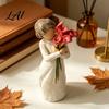 Decorative Bouquet Figurine Girl Holding Resin Figurine Faceless Lady Statue Romantic Desktop Ornament for Flower Statue Living Room Bedroom
