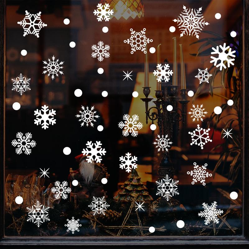 Christmas snowflakes and electrostatic stickers glass windows shop windows decorate the living room on both sides