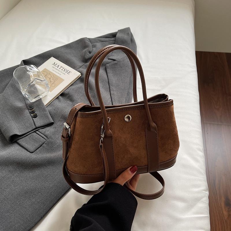 High-value fashionable contrasting color bucket bag, new autumn shoulder bag, simple and exquisite portable messenger bag
