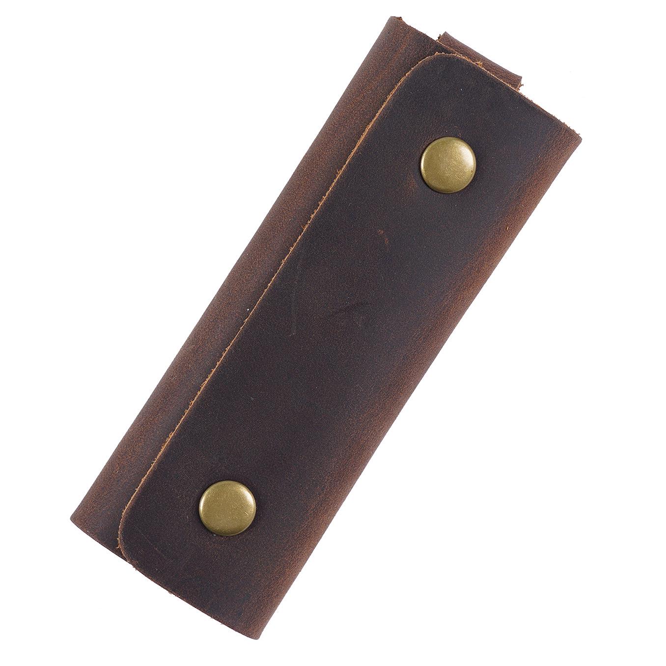 

Unisex Leather Key Pouch: Compact Holder for Door, Car, and Home Keys.