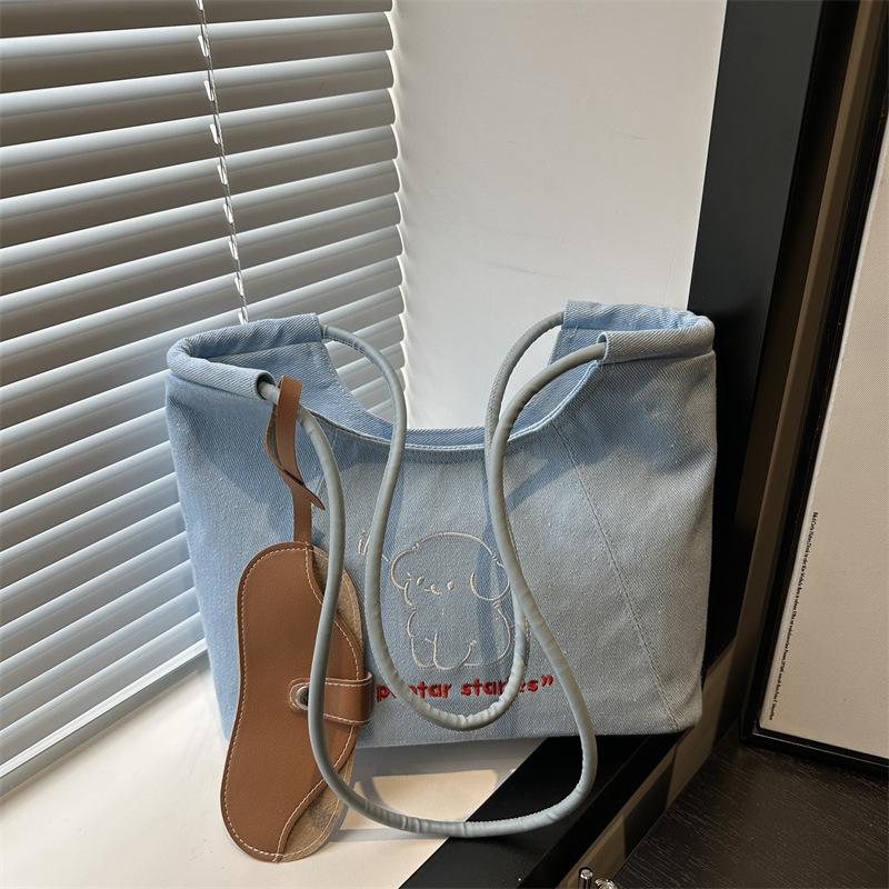 

Cartoon denim canvas bag women s 2025 new trendy fashion Korean tote bag versatile large-capacity armpit bag синий