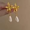 Light luxury personality French retro flower fringed earrings women, niche design high-end temperament pearl pendant earrings