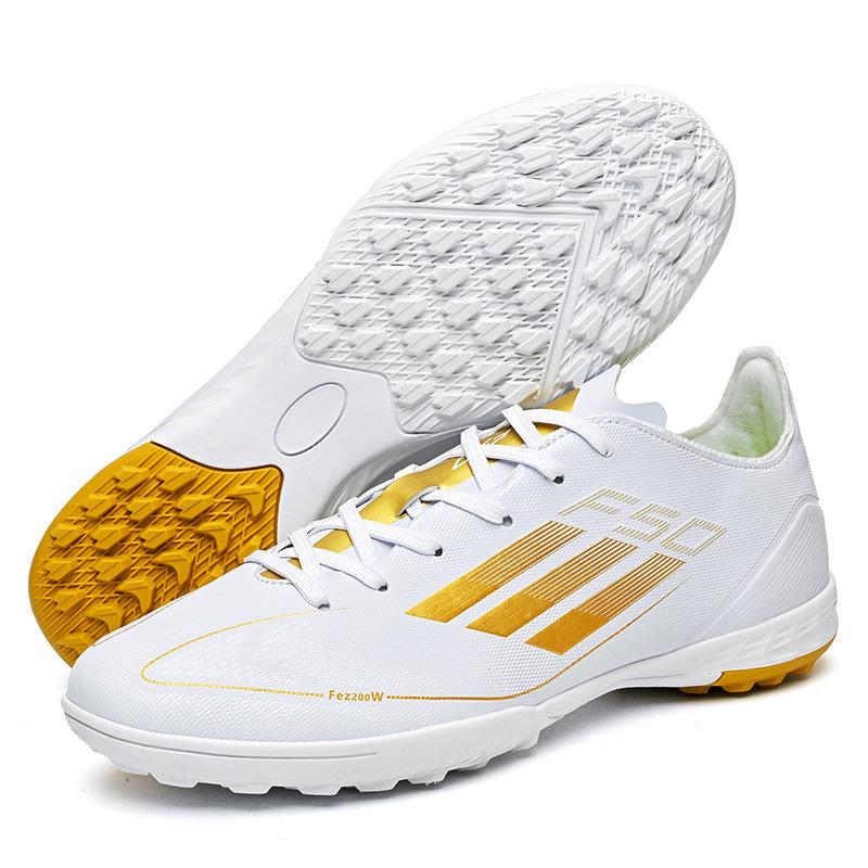 

2025 new football shoes training shoes young students broken nails long nails children artificial grass sports shoes 45