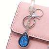 Natural Stone Crystals Teardrop Shape Photo Locket Keychain Featuring Diamonds Cut Designs for Sentimental Gifts