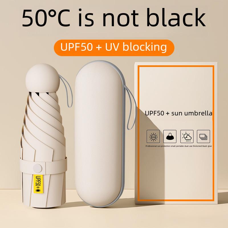 Compact Capsule Umbrella: 50% Foldable, Portable, Pocket-Size for Sunny and Rainy Days