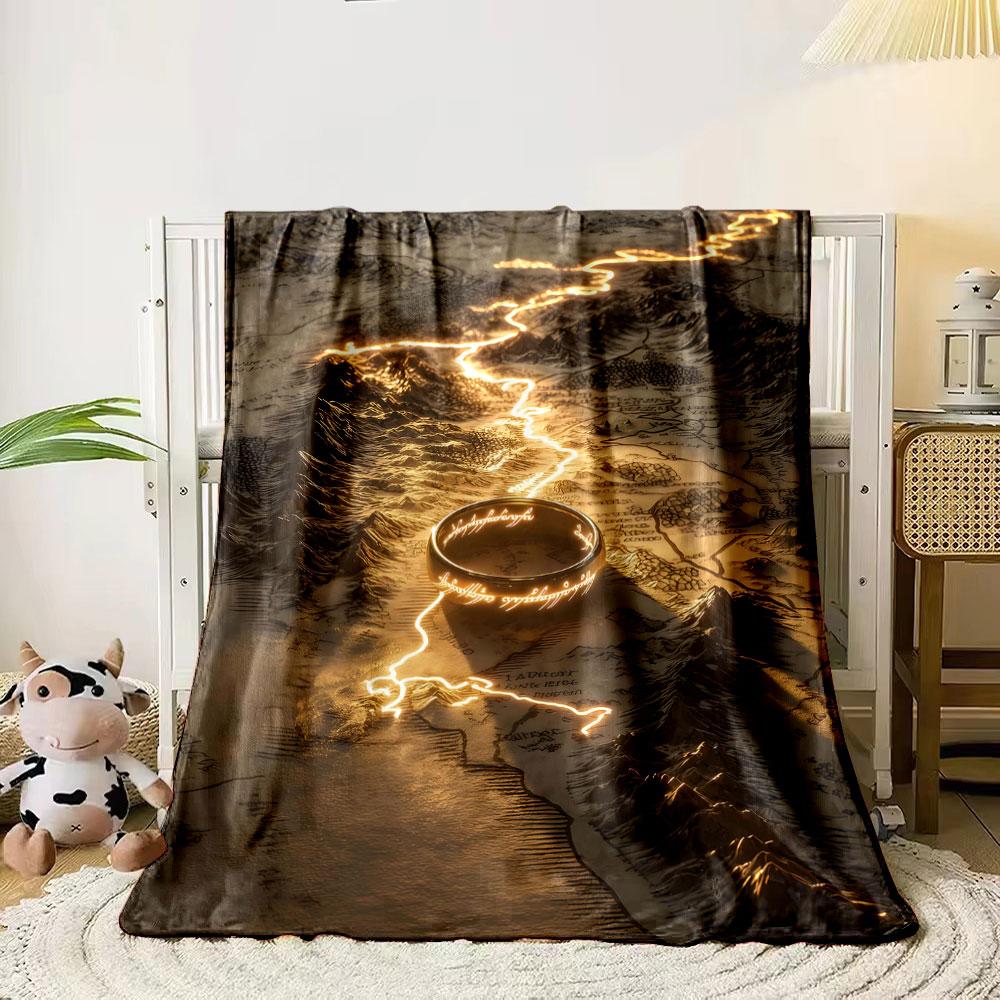 A glowing ring rests on a map with a bright, winding golden path. for all seasons blanket lunch break throw gift 80cm x 120cm