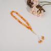 Hui Muslimischer 33-Perlen Kristall Tasbih: Handgefertigtes Rosenkranzarmband aus Bernsteinimitat