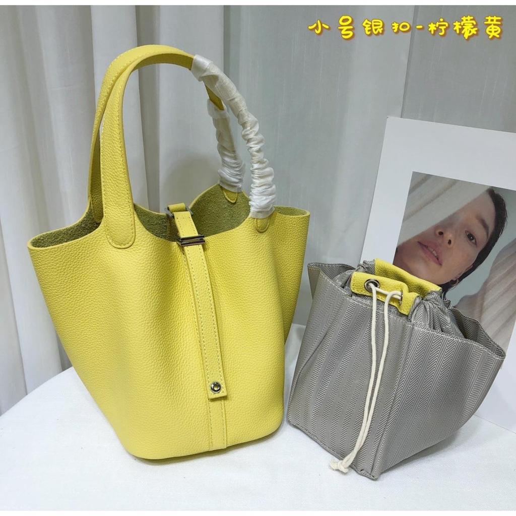 Spot wholesale top layer cowhide vegetable basket bag leather bucket bag commuter fashion lock buckle hand-held handbag woman