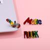 Rainbow English Brooch: Colorful Guitar Metal Badge and Electroplated Clothing Accessory.