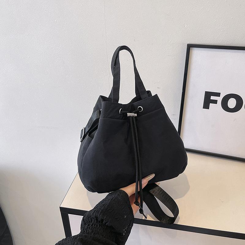 Casual Niche Drawstring Hand-held Bucket Bag Crossbody Bag for Women 2026 New Trendy Versatile Simple Small Bag Cloth Bag