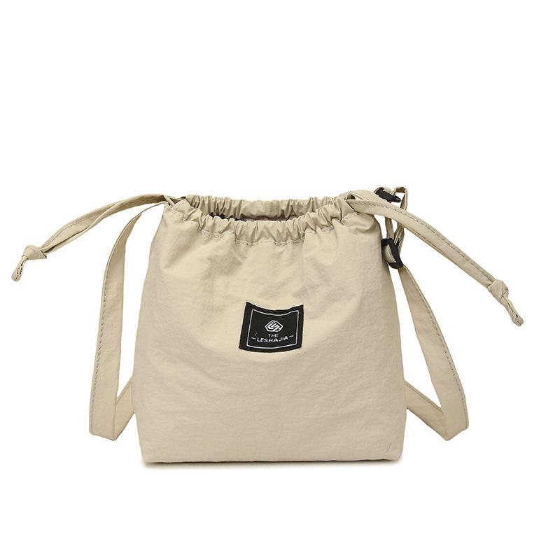 Mobile phone bag women's simple versatile drawstring messenger bag trendy brand shoulder bag leisure sports nylon bag