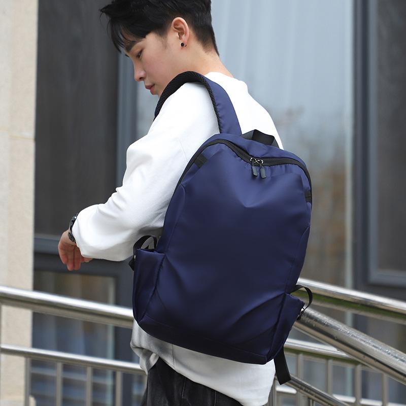 Schoolbag manufacturers wholesale fashion men's and women's simple school bags Oxford cloth large capacity computer backpack business bag