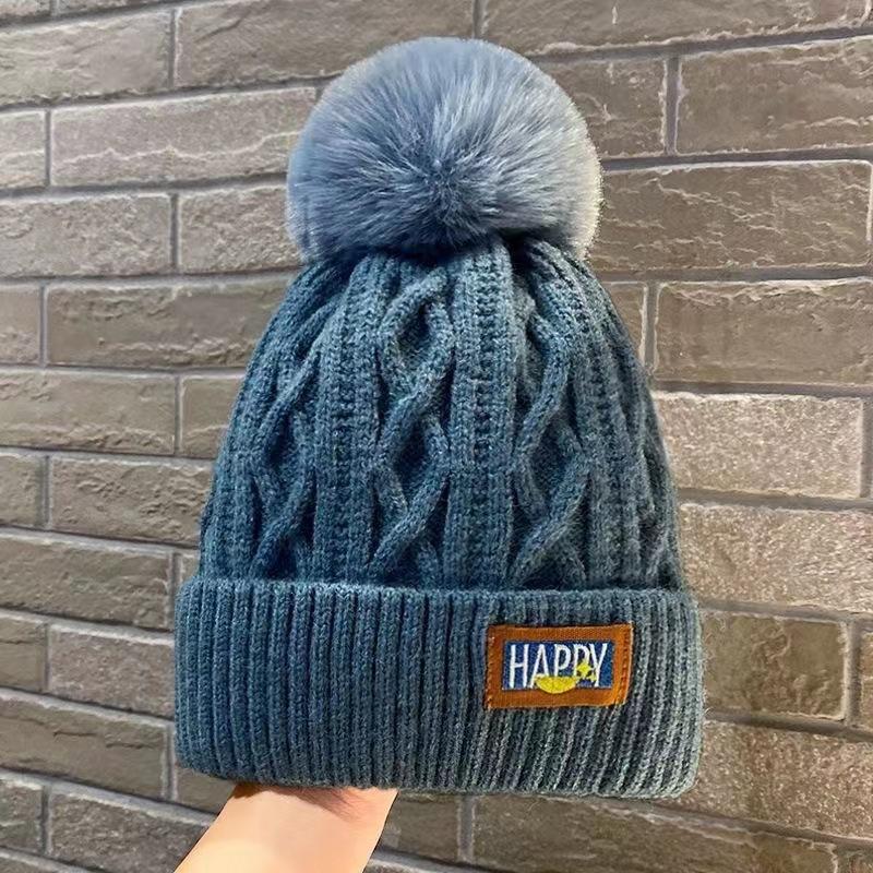 Cappelli di lana con lettera invernale Cappelli di protezione per le orecchie con berretto lavorato a maglia caldo moda femminile coreana