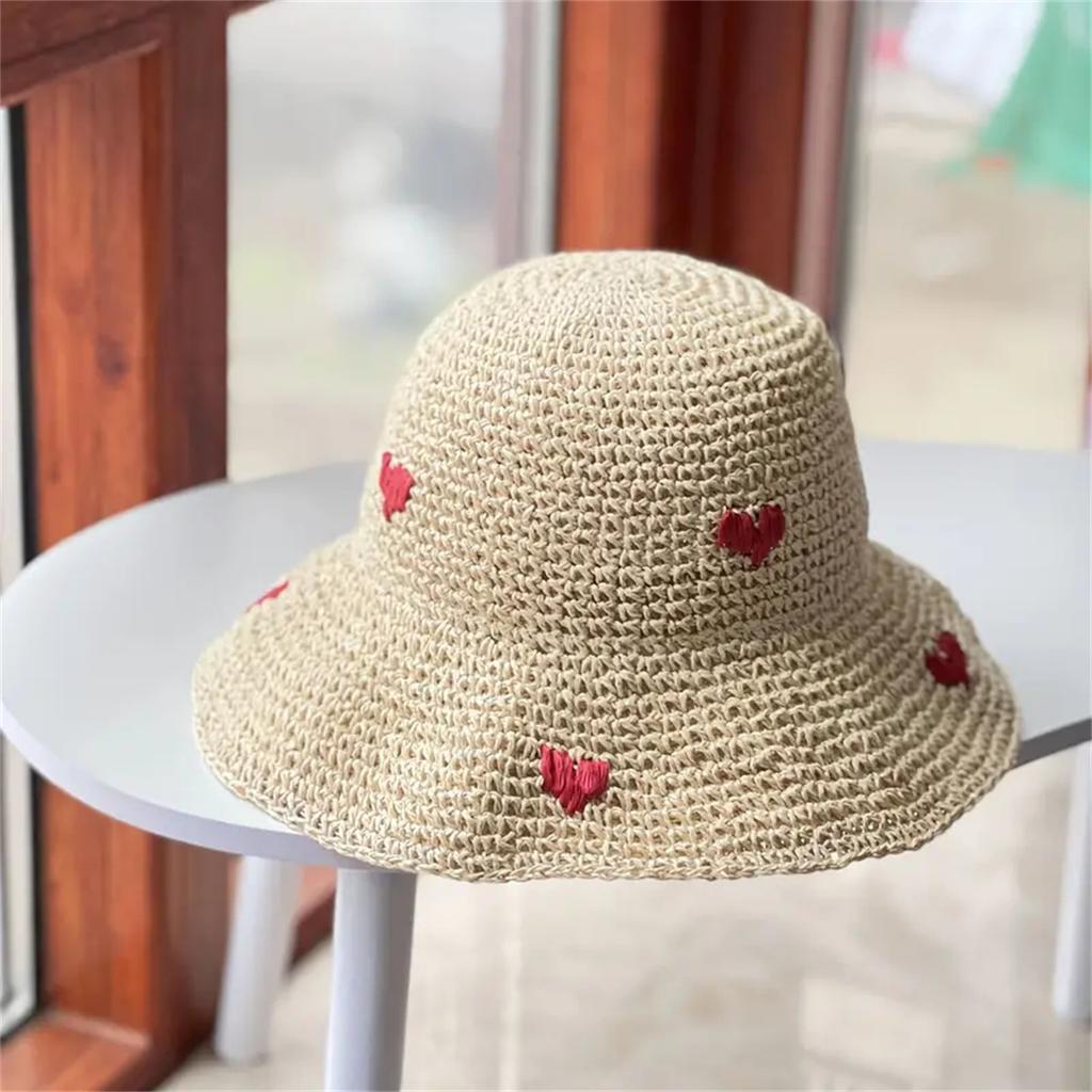 An Insta-style wavy edge large eaves straw fisherman hat women's summer braided love straw hat holiday beach breathable sunshade