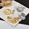 Light Luxury Super Fairy Hollow Metal Petal Fringed Ear Buckle Fashionable Design High-end Temperament Elegant Earrings