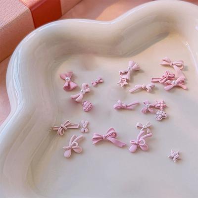 10ks Dlouhé Růžové Pryskyřičné Mašličky Charmy pro Nail Art 3D Kawaii Matné Vílí Mašličky na Nehty Dekorativní Díly DIY Designové Doplňky na Nehty