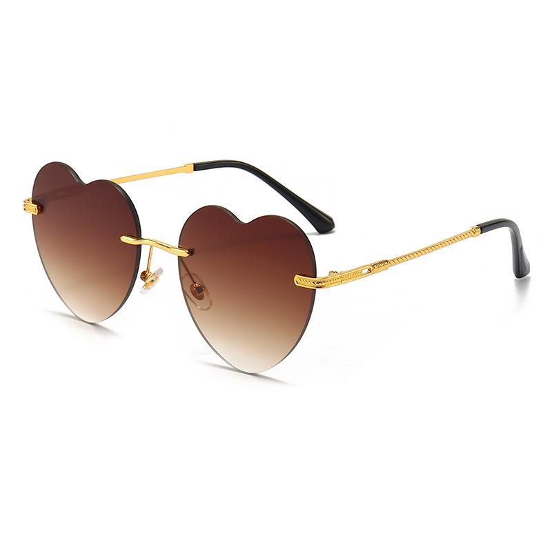 New Women's Heart-Shaped Rimless Metal Sunglasses - Trendy European and American Fashion