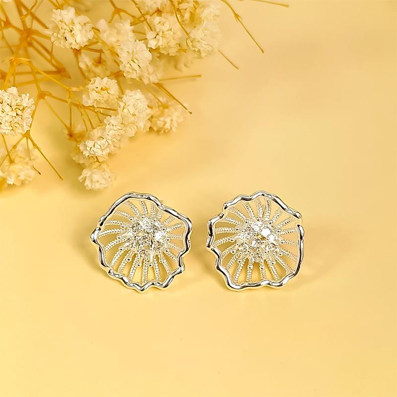 Copper-Plated Gold and Silver Hollowed Flower Zircon Stud Earrings - Retro Style, Fashionable, Individualistic, and Luxurious.